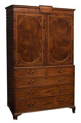 Lot 777 - George III mahogany linen press