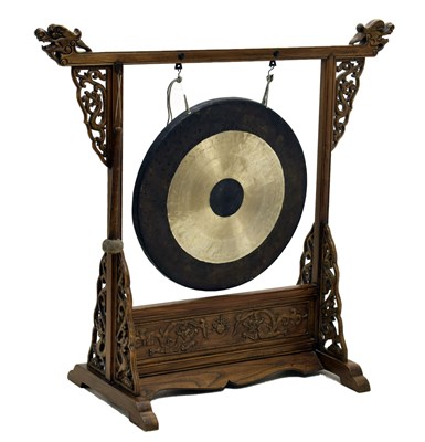 Lot 362 - East Asian carved hardwood gong and stand