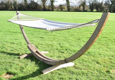 Lot 828 - Large teak framed garden hammock