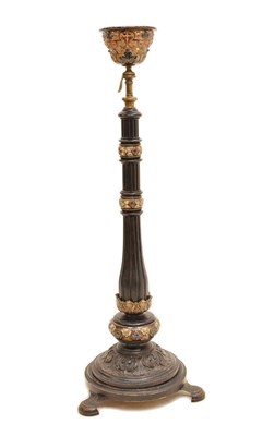 Lot 471 - Late 19th century ebonised wood and ceramic oil lamp holder