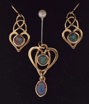 Lot 88 - Yellow metal and black opal triplet pendant and drop earrings