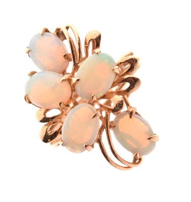 Lot 11 - 14ct gold dress ring set five opal cabochons
