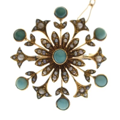 Lot 73 - Turquoise and seed pearl floral yellow metal brooch