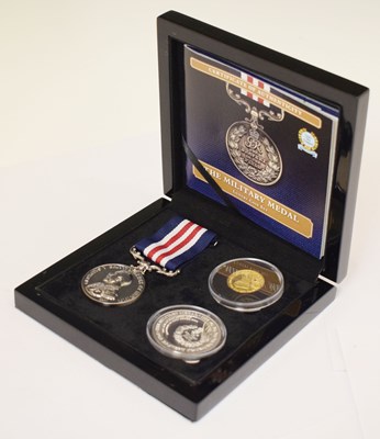 Lot 356 - Tristan da Cunha - Elizabeth II The Military Medal gold and silver commemorative set, 2016
