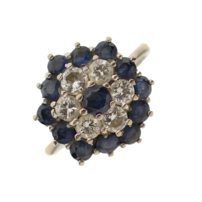Lot 26 - Sapphire and diamond cluster ring