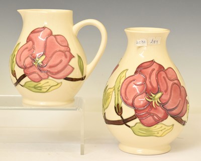 Lot 565 - Moorcroft - Baluster vase and jug in the Magnolia pattern
