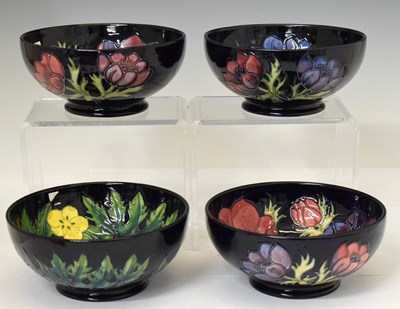 Lot 569 - Moorcroft - Three bowls in the Anemone pattern