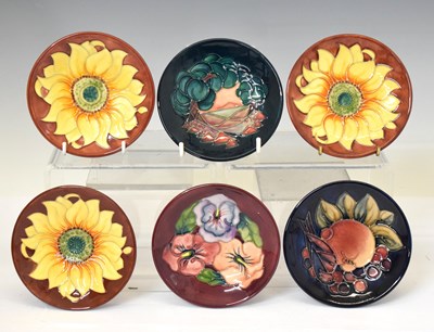 Lot 571 - Moorcroft - Six pin dishes