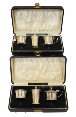 Lot 221 - Two George V silver three-piece condiment sets