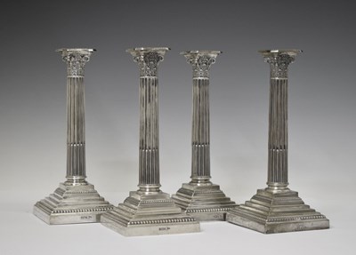 Lot 165 - Set of four Edwardian candlesticks, of Corinthian column form