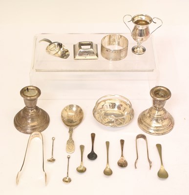 Lot 242 - Collection of silver candlesticks, napkin ring, spoons etc