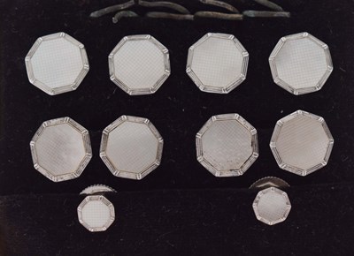 Lot 146 - Cased mother-of-pearl and 9ct white gold octagonal cufflink and dress stud set