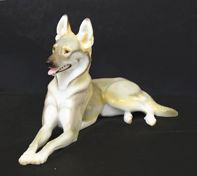 Lot 574 - 20th century Nymphenburg porcelain figure of a recumbent German shepherd dog