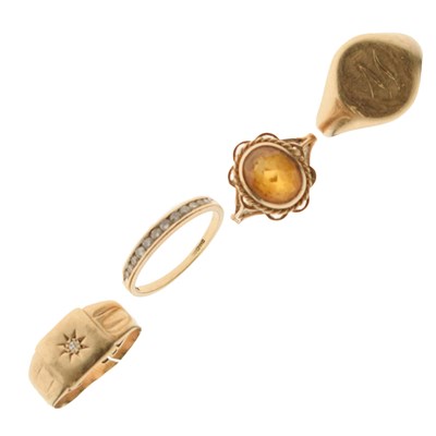 Lot 14 - Four various 9ct gold rings comprising a diamond half eternity ring, etc