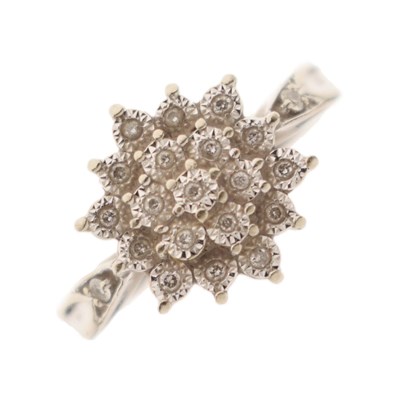 Lot 1 - White metal and diamond cluster ring