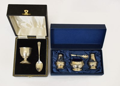 Lot 244 - Silver cruet set and cased egg cup and spoon