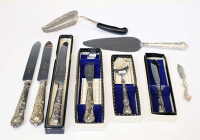 Lot 267 - A collection of silver handled knives, cake servers, etc.