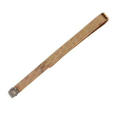 Lot 145 - 9ct gold and diamond tie clip