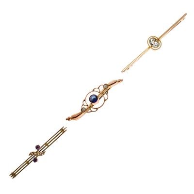 Lot 73 - 15ct yellow metal and aquamarine bar brooch, together with two 9ct yellow metal bar brooches