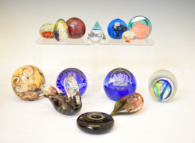 Lot 550 - A collection of glass paperweights