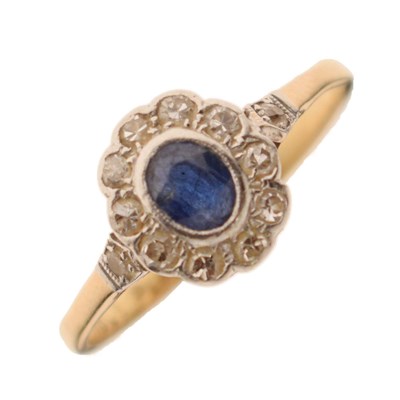 Lot 19 - Yellow metal sapphire and diamond cluster ring