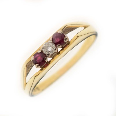 Lot 20 - 18ct gold ruby and diamond three-stone ring