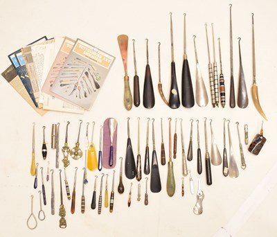 Lot 483 - A collection of novelty button hooks and shoe horns
