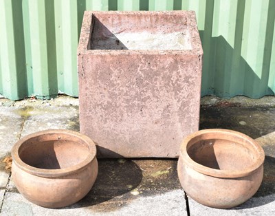 Lot 747 - Late 20th century garden planter of cube form, together with a pair of terracotta pots