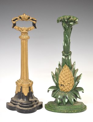 Lot 496 - Two painted cast-iron doorstops or porters