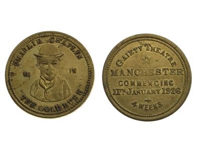 Lot 405 - Charlie Chaplin - Two 1926 Gaiety Theatre, Manchester 'Gold Rush' tokens