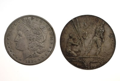 Lot 418 - 1880 American silver one dollar, sealed in card mount, plus Eiffel Tower medallion