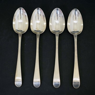 Lot 273 - Set of four George III silver table spoons