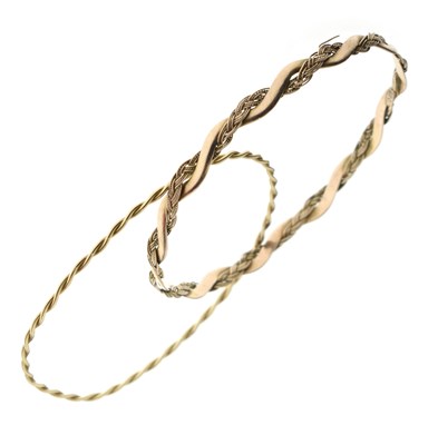 Lot 115 - Two 9ct gold bangles