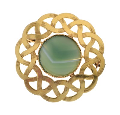 Lot 64 - Celtic style 9ct gold brooch set a banded green agate