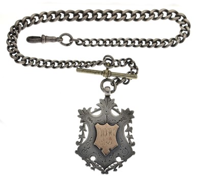 Lot 104 - Late Victorian graduated curb link silver Albert and fob