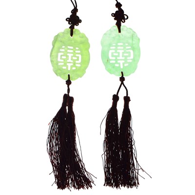 Lot 576 - Two Chinese carved jade pendants