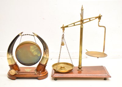 Lot 484 - Early 20th century brass table gong, together with a pair of brass balance scales