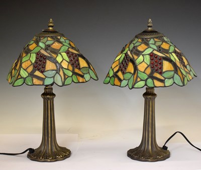 Lot 378 - Pair of Tiffany style table lamps, the shades with grape decoration