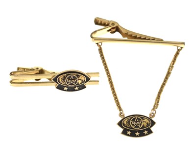 Lot 174 - 'Caltex' enamel decorated tie clips