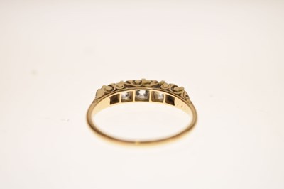 Lot 8 - Unmarked yellow metal five-stone diamond ring