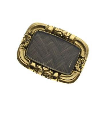 Lot 92 - Georgian or Victorian hairwork yellow metal memorial brooch