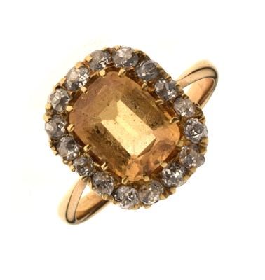 Lot 29 - Imperial yellow topaz and diamond cluster ring