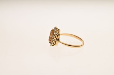 Lot 29 - Imperial yellow topaz and diamond cluster ring