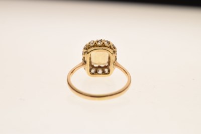 Lot 29 - Imperial yellow topaz and diamond cluster ring
