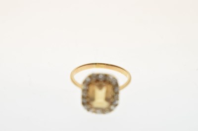 Lot 29 - Imperial yellow topaz and diamond cluster ring