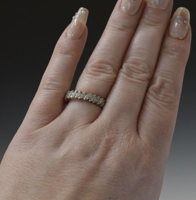 Lot 12 - Diamond marquise unmarked white metal full eternity ring