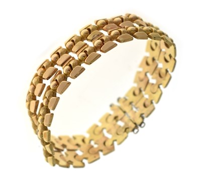 Lot 154 - Yellow metal double row fancy bracelet