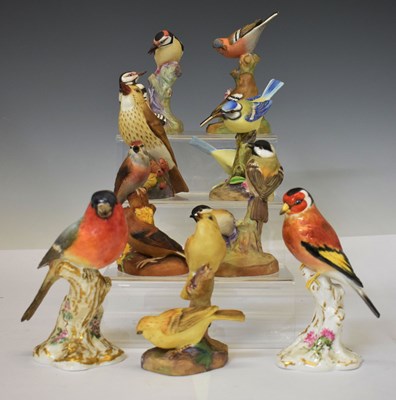 Lot 557 - Nine Royal Worcester bird figures and groups