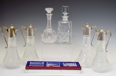 Lot 401 - Six moulded glass and claret jugs