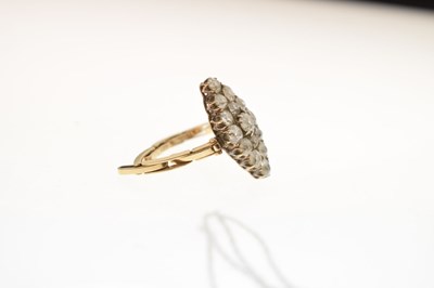 Lot 11 - Early 20th century diamond marquise yellow metal ring